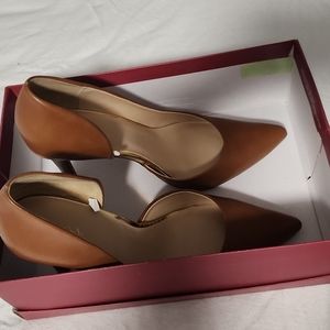 Cognac pumps are slightly worn in excellent condition with a box.